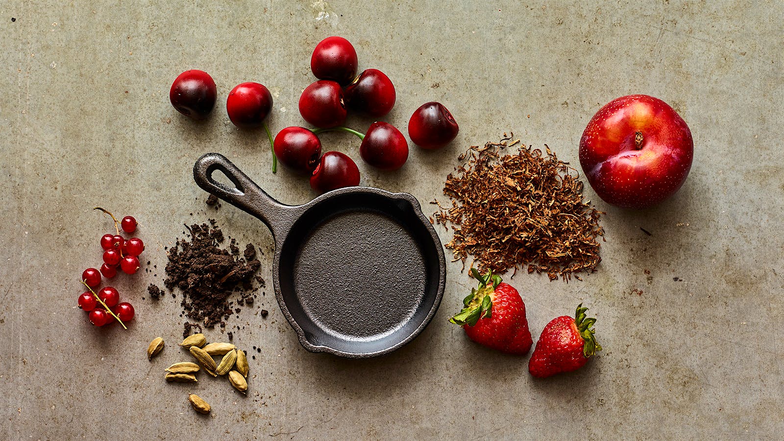 Red currants, earth, cardamom pods, cherries, cast-iron pan, tobacco, strawberries, plum