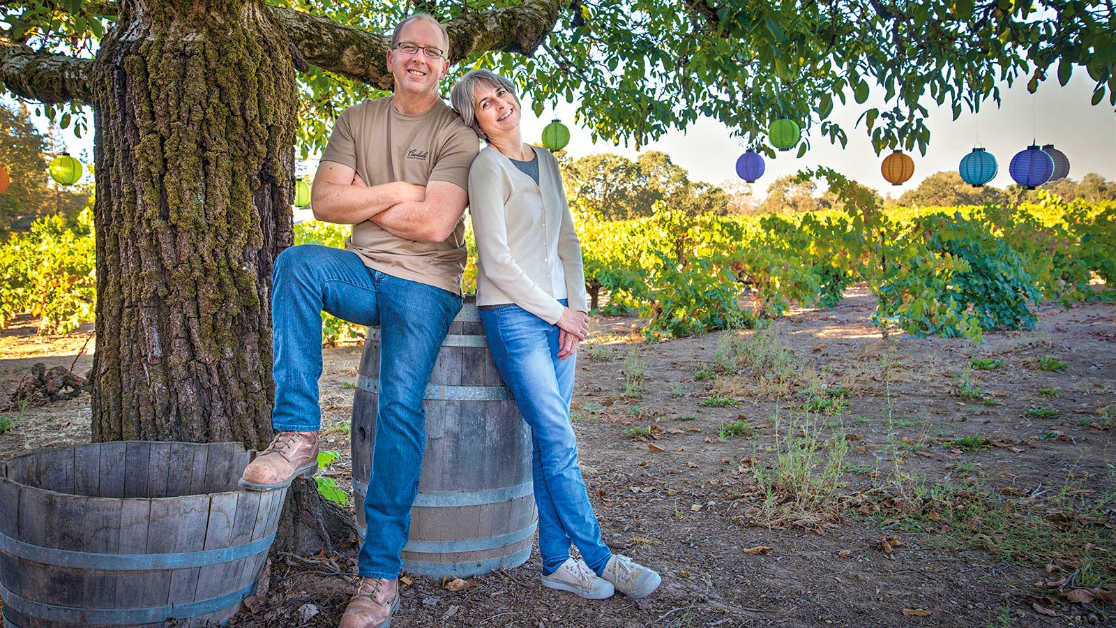 Mike and Kendall Officer stand at their Carlisle vineyard